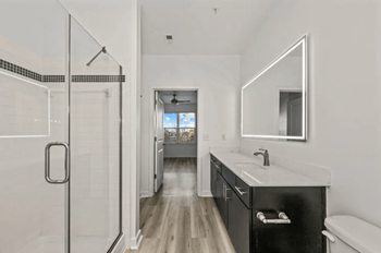 Glass-enclosed shower